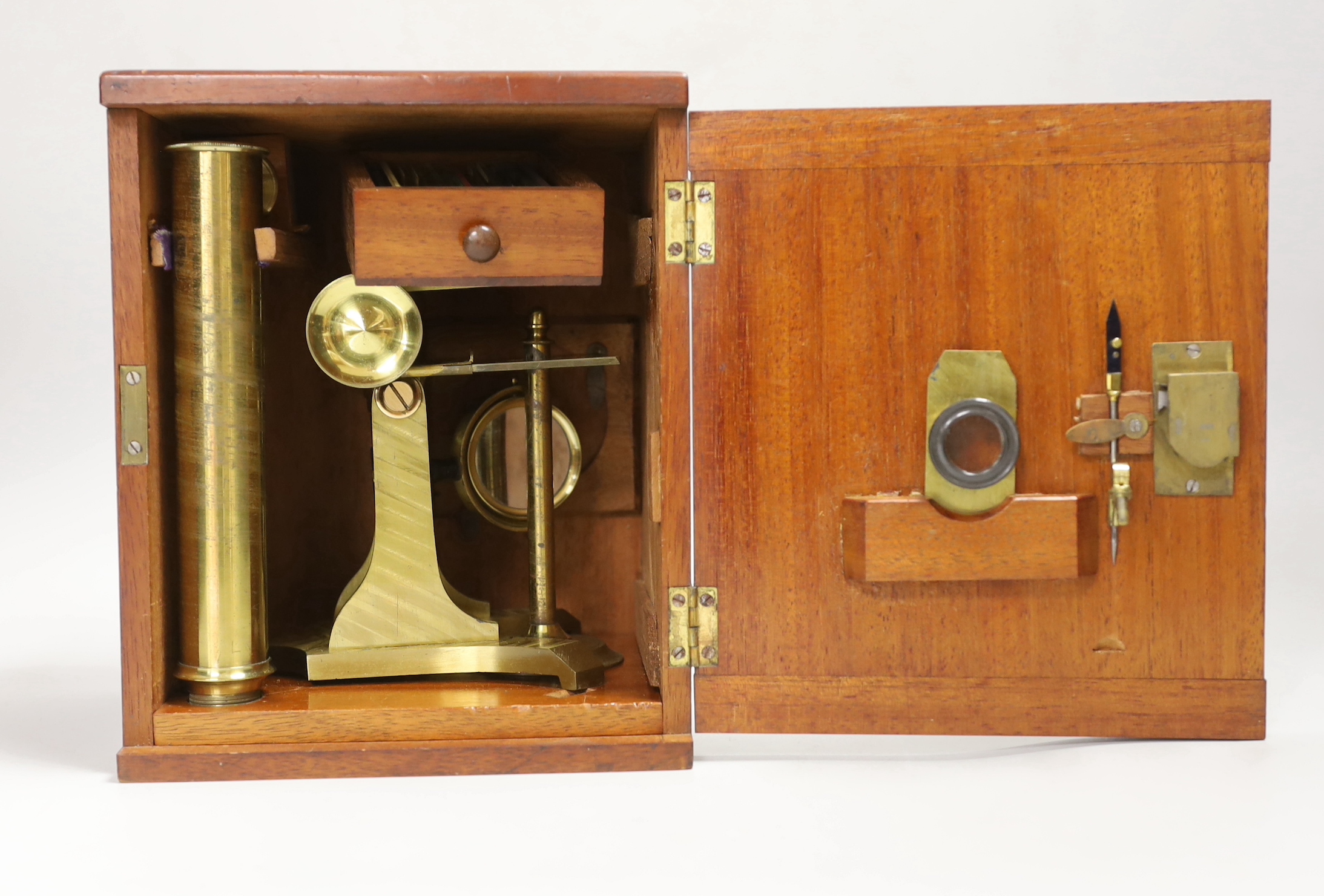 A Victorian mahogany-cased microscope with slides, case 22cm high